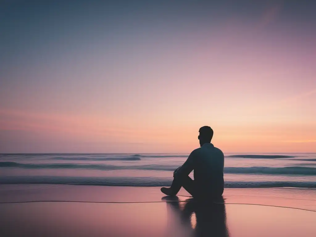 Mejora salud mental con PNL: Persona en playa tranquila rodeada de luz y colores suaves